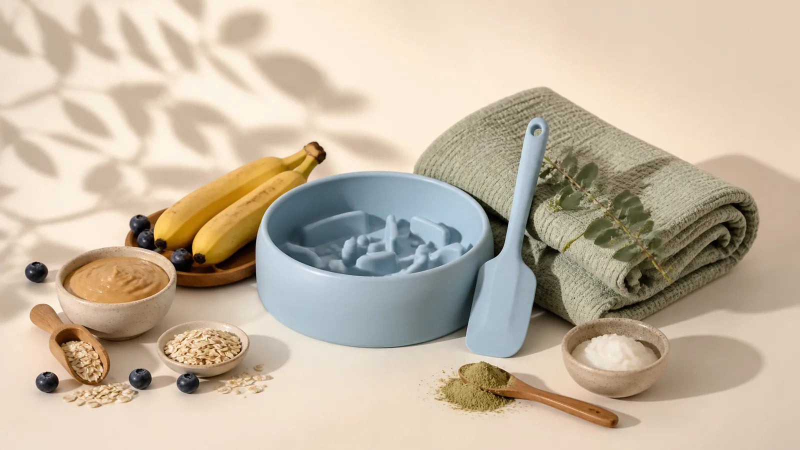 Curated blue pet enrichment bowl and feeding accessories